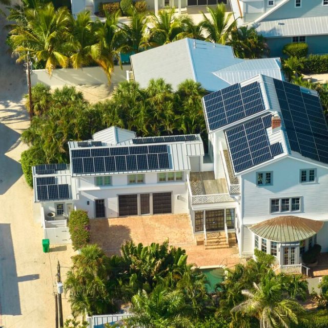 residential-house-with-rooftop-covered-with-solar-photovoltaic-panels-producing-clean-electrical-energy-suburban-rural-area-concept-investment-autonomous-home