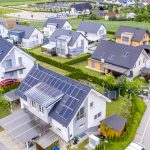aerial-view-private-houses-with-solar-panels-roofs-1170x620